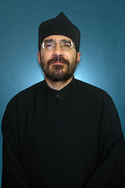 Dn George Haloulakos